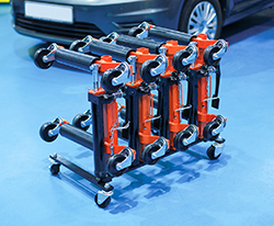 Streamline Vehicle Positioning with Power-TEC's Hy-Jacks — now available in sets of four complete with mobile storage stand